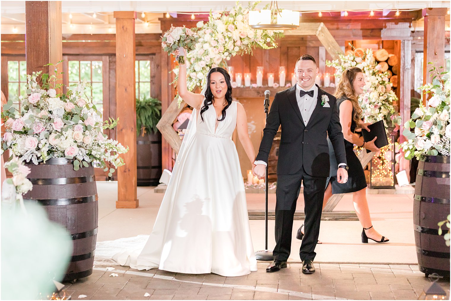 bride and groom turn to leave rustic wedding ceremony at Hamilton Manor