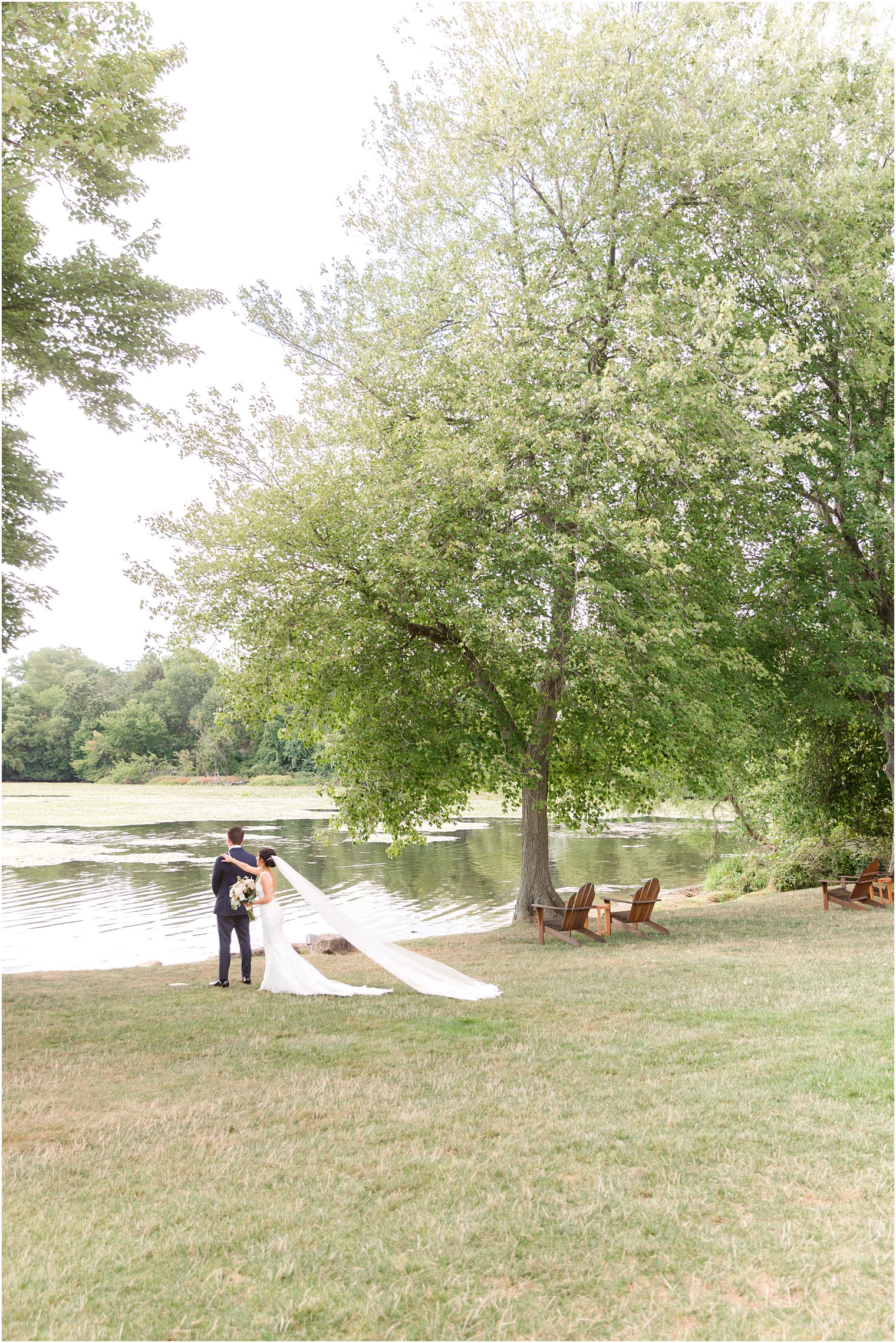 bride and groom hug during first look at Indian Trail Club