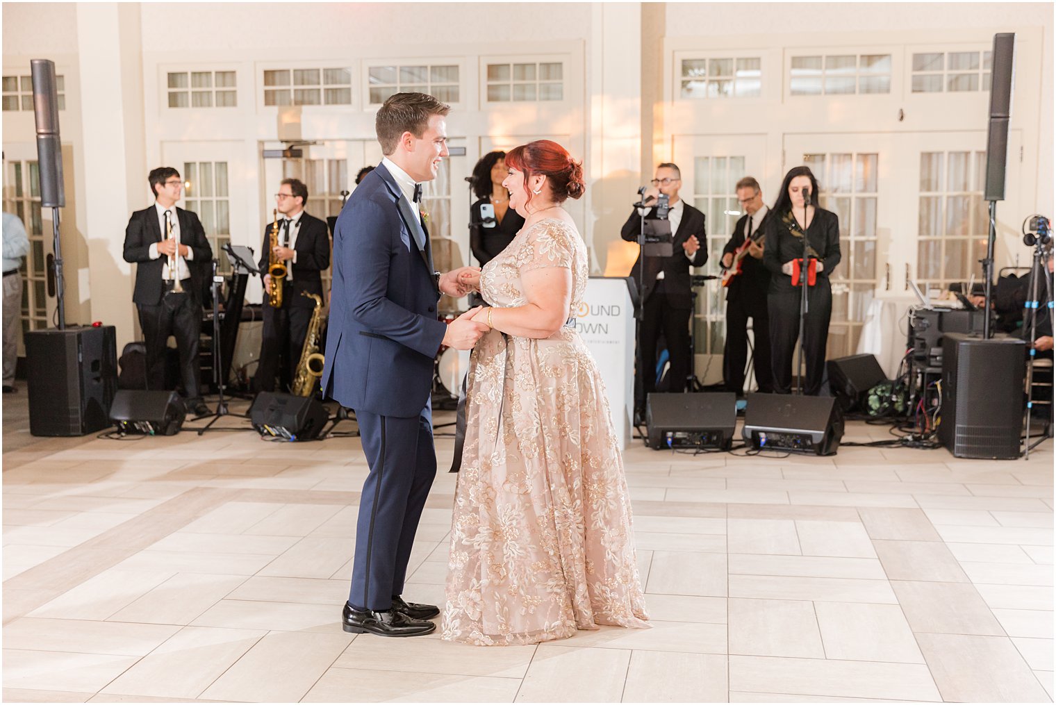 groom Danes with mother in gold dress