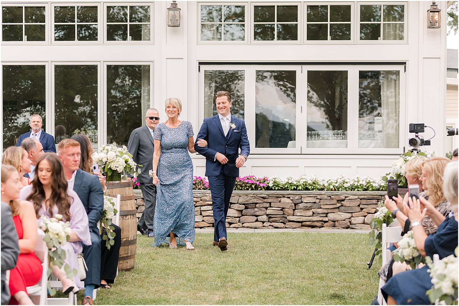 groom walks mother down aisle at Indian Trail Club