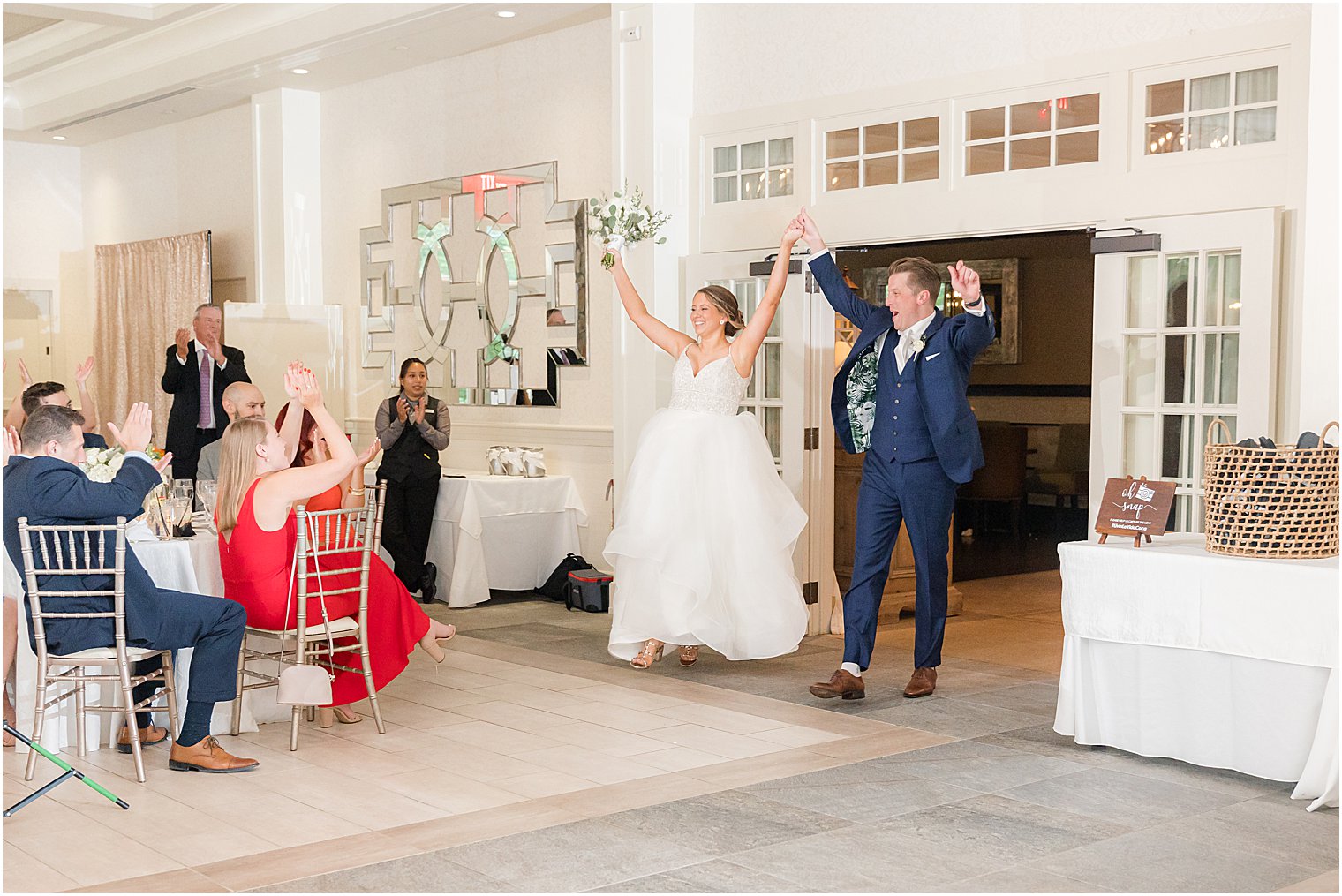 newlyweds enter Franklin Lakes, NJ wedding reception