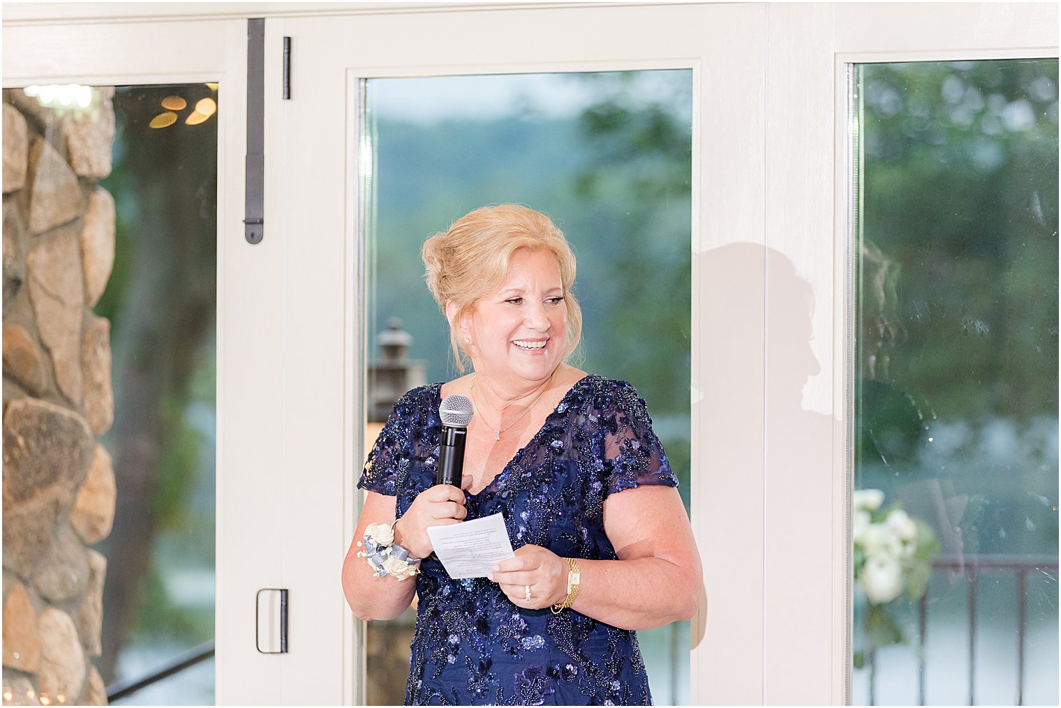 mother watches dances during reception 