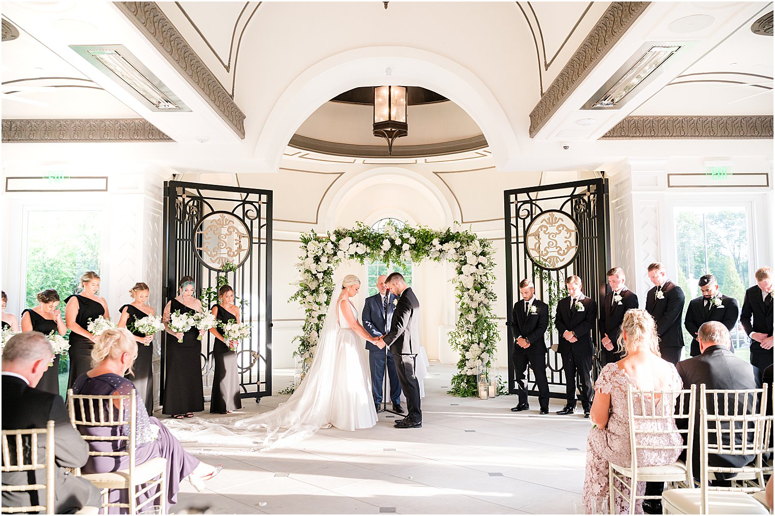 newlyweds exchange vows during ceremony at Shadowbrook at Shrewsbury