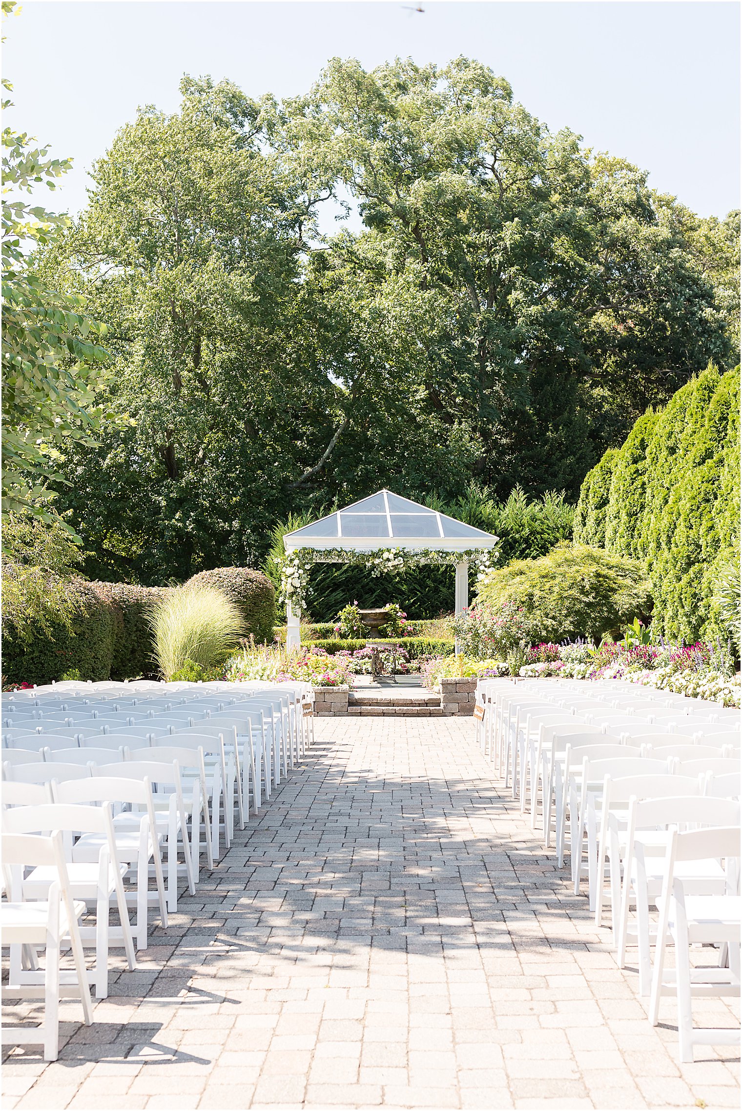 outdoor ceremony site in garden at The Mill Lakeside Manor