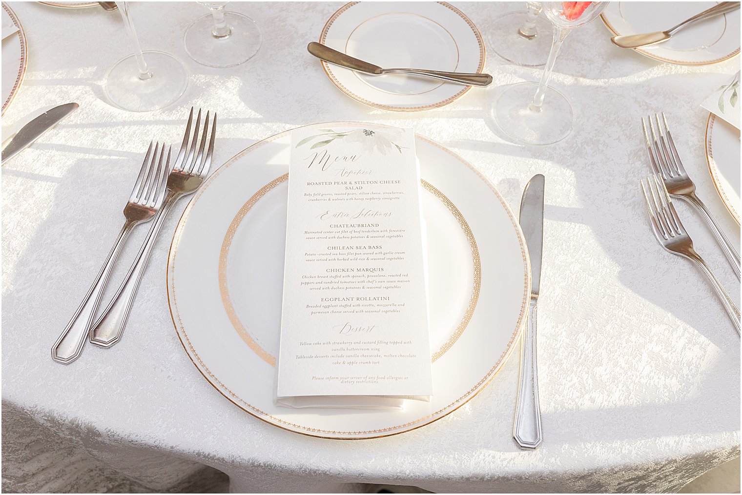 gold and ivory details for place settings at The Mill Lakeside Manor