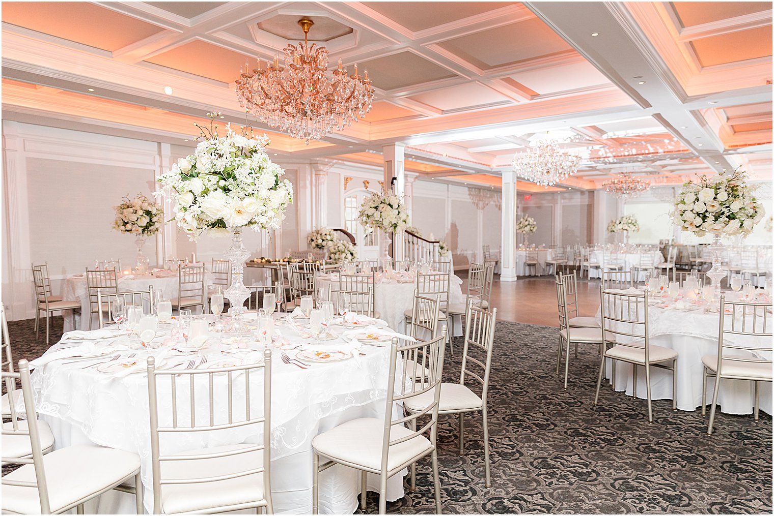 wedding reception at The Mill Lakeside Manor with coral uplighting 