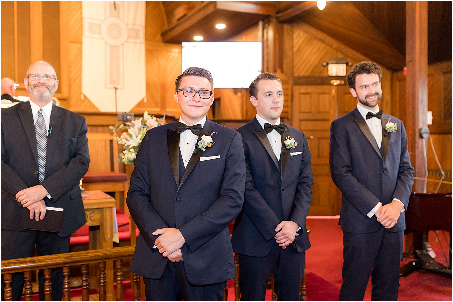 groom watches bride enter St. Andrew's United Methodist Church