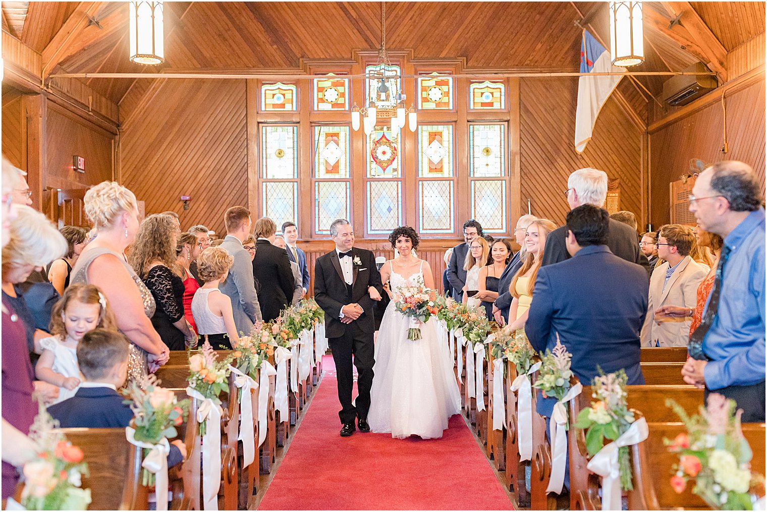 bride and father walk down aisle at St. Andrew's United Methodist Church in Spring Lake NJ