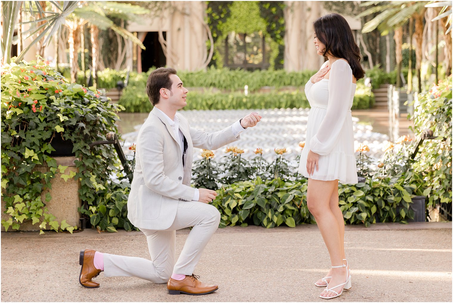 man kneels during Longwood Gardens Proposal