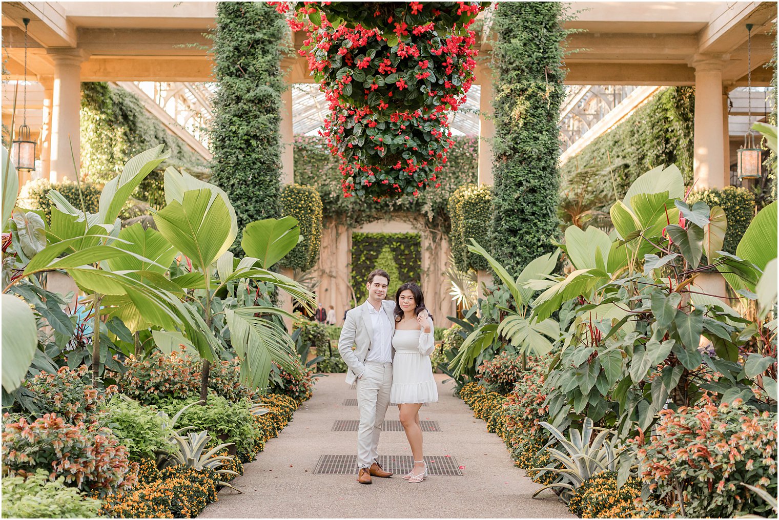 couple stands in display at Longwood Gardens