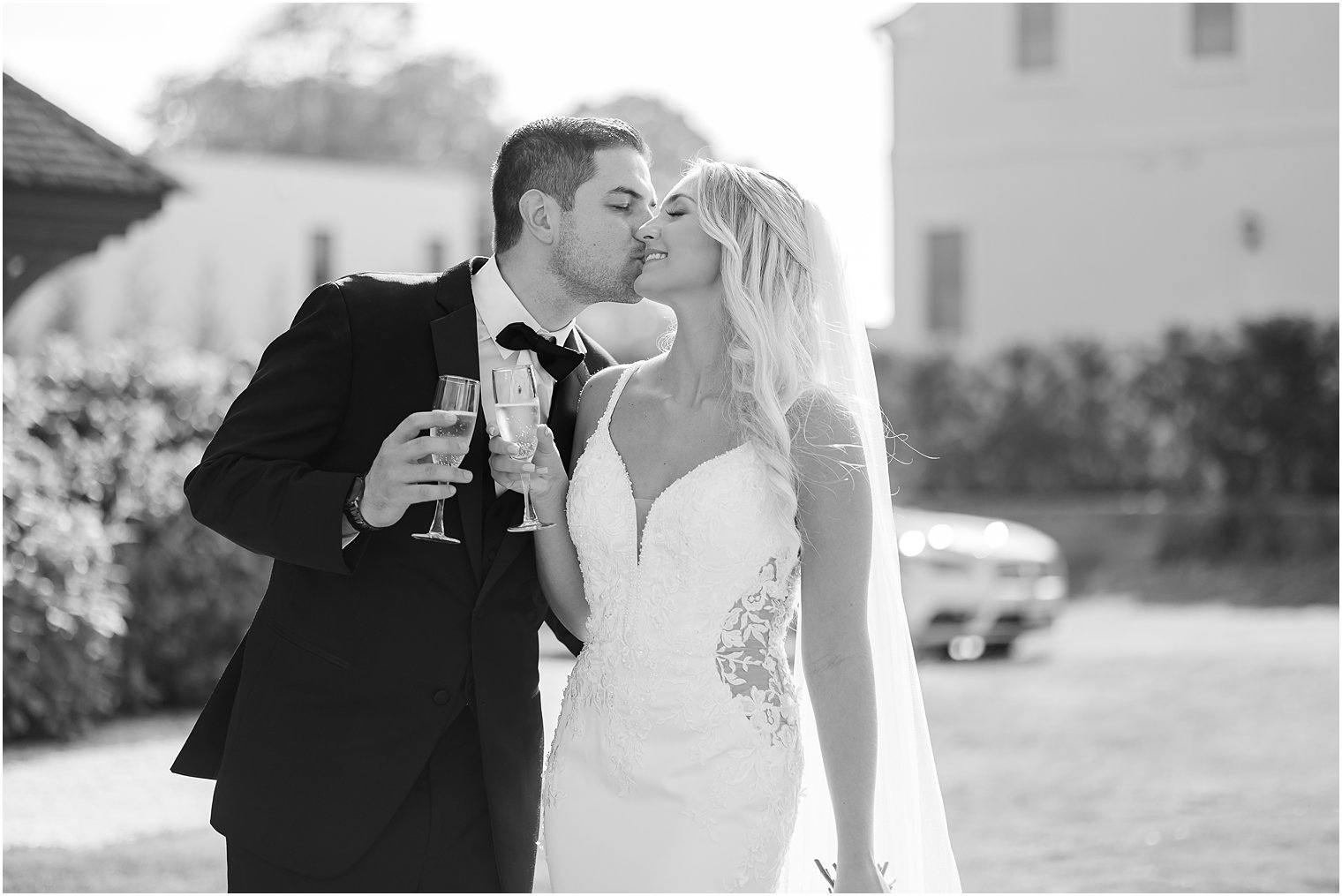 bride and groom toast champagne glasses