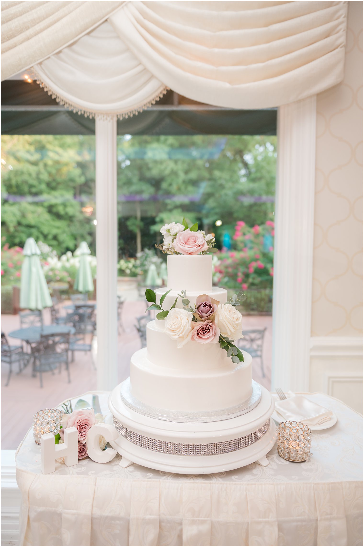 tiered wedding cake on table at The English manor