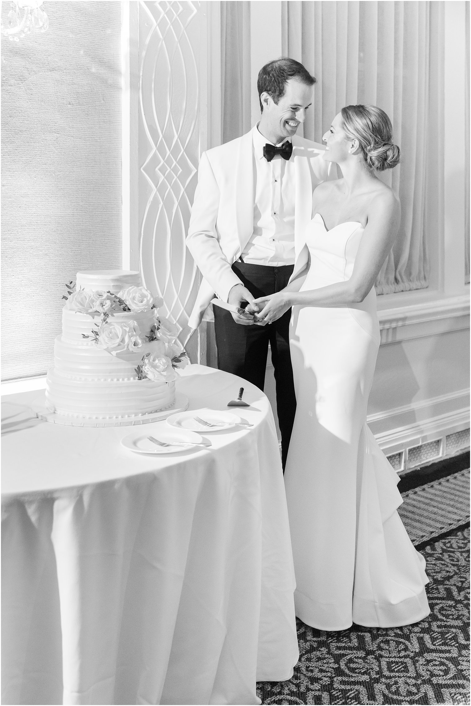 bride and groom cut wedding cake at the Berkeley Oceanfront Hotel