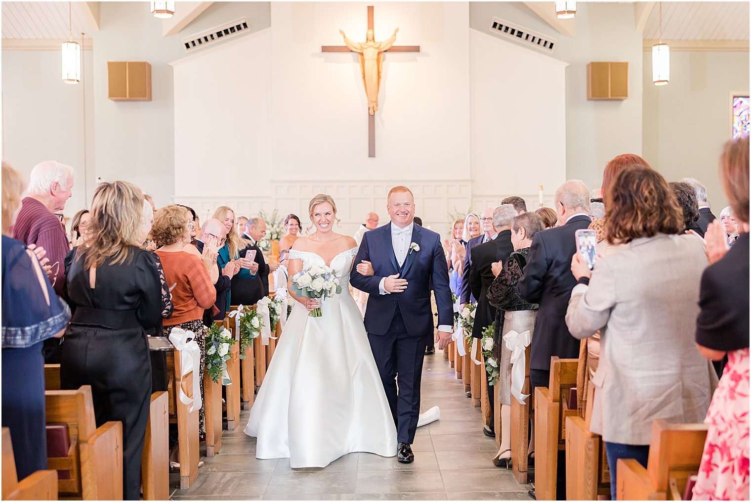 newlyweds leave traditional church wedding on Long Beach Island
