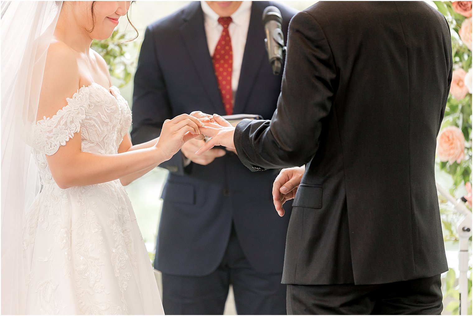 bride and groom exchange vows during ceremony in New Jersey 