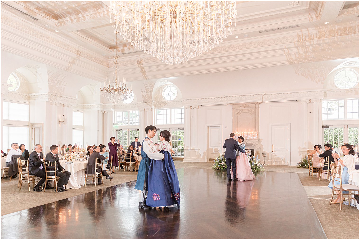 newlyweds dance with parents during NJ wedding reception