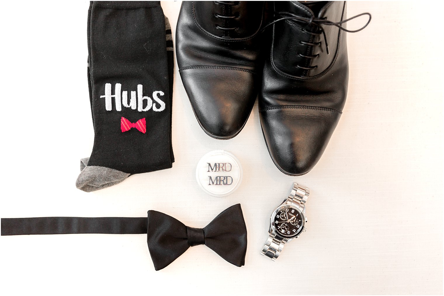 groom's classic black shoes, ring box, and watch for NJ wedding