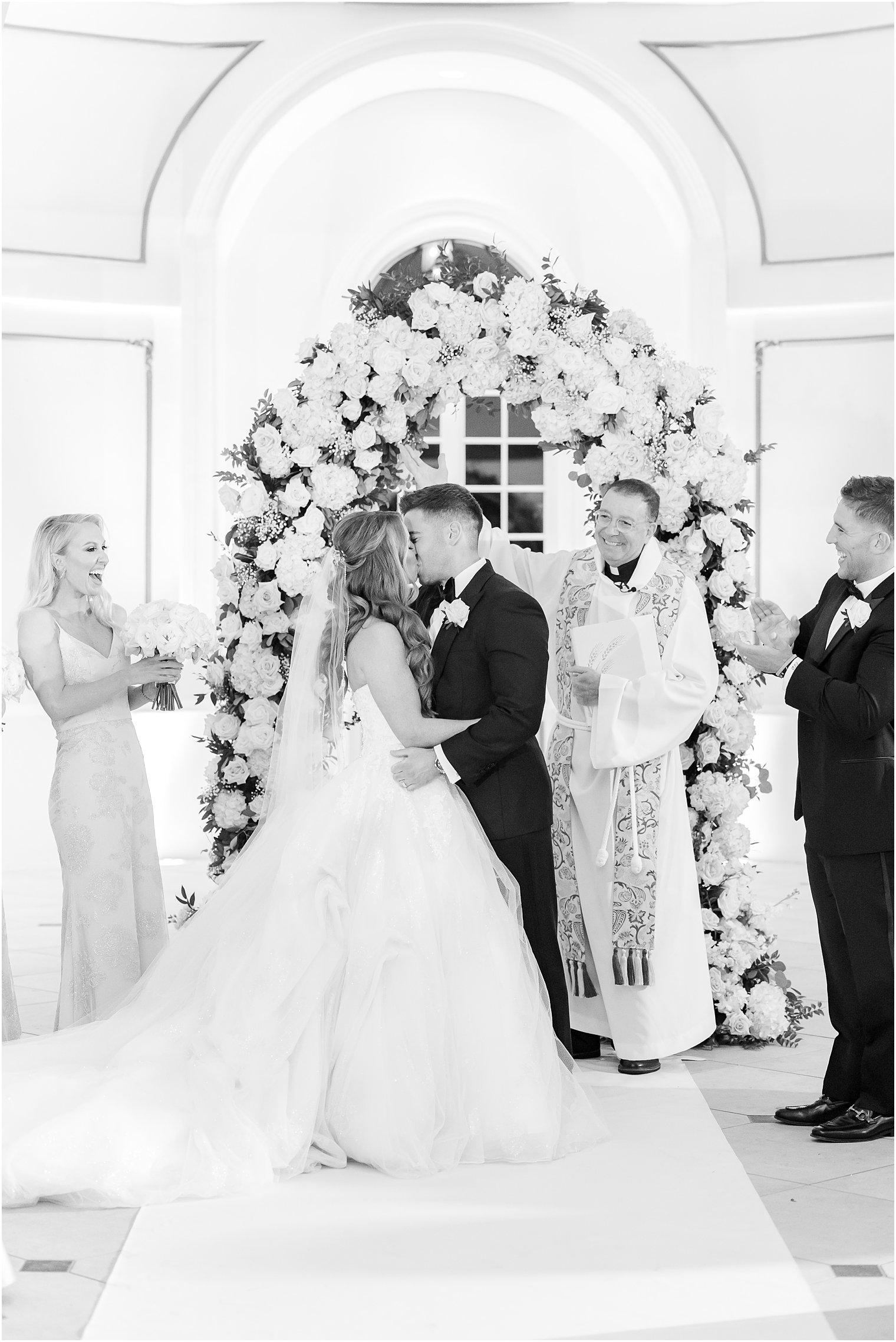 bride and groom kiss during wedding ceremony at Shadowbrook at Shrewsbury wedding