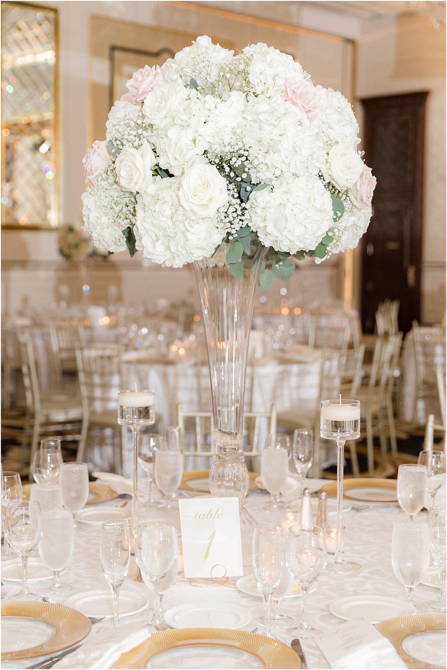 tall centerpiece with white flowers at Shadowbrook at Shrewsbury