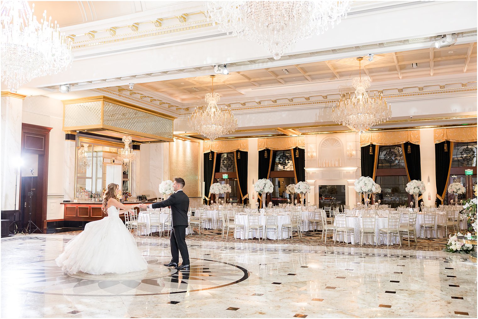 groom twirls bride in ballroom at Shadowbrook at Shrewsbury