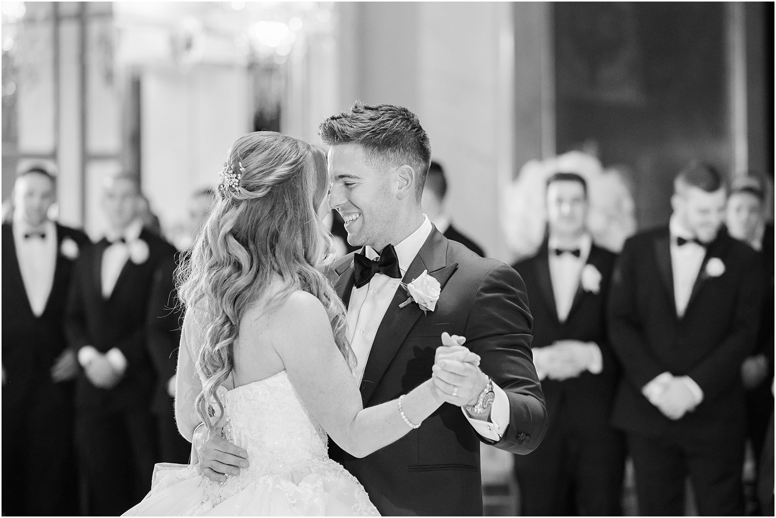 bride and groom lean together during first dance at Shadowbrook at Shrewsbury