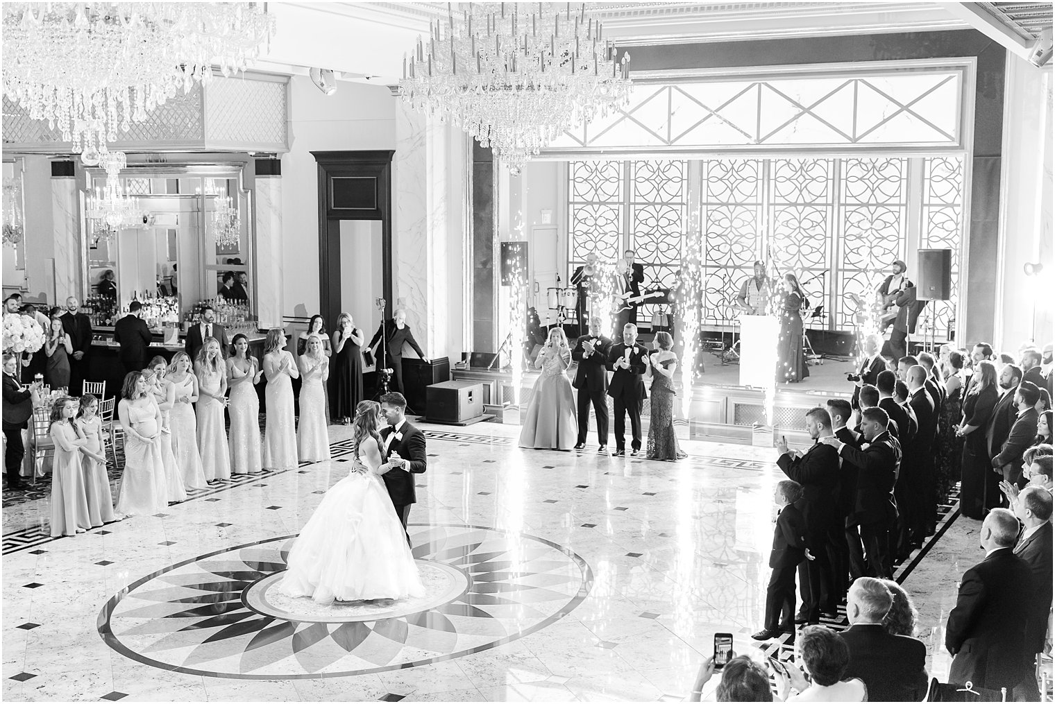 groom dips bride during first dance in Shadowbrook at Shrewsbury ballroom 