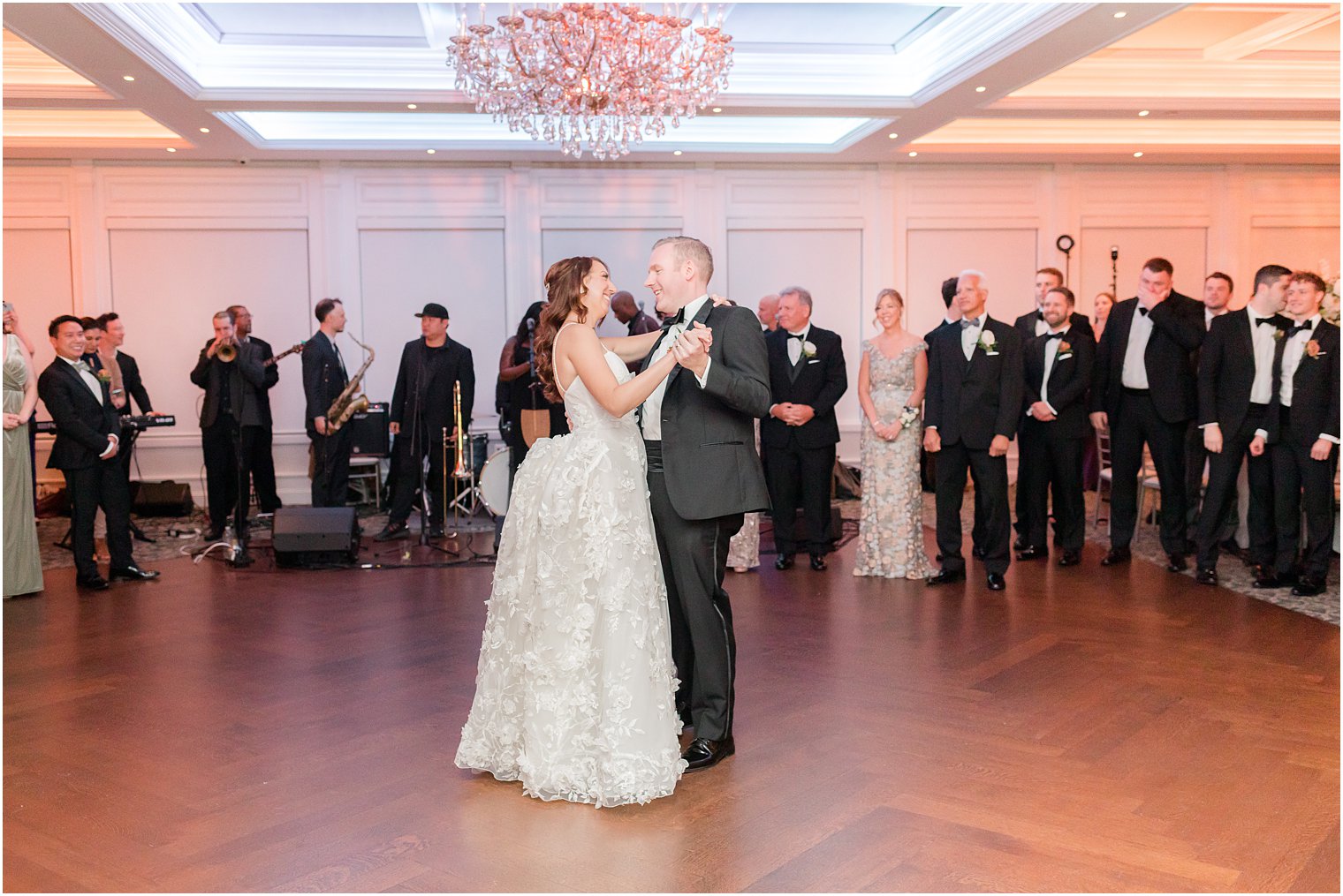 bride and groom have first dance inside The Mill Lakeside Manor 