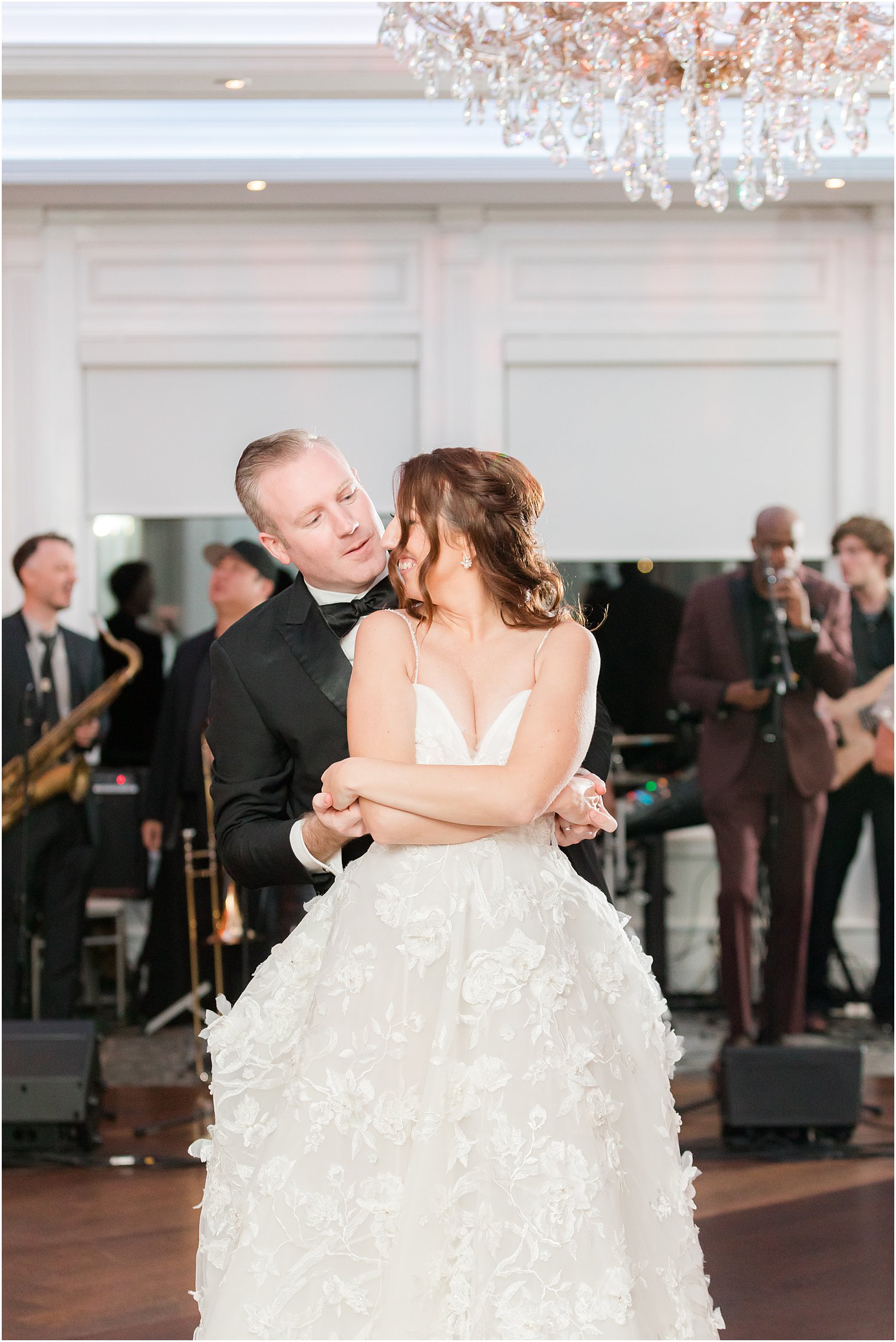 groom spins bride during first dance