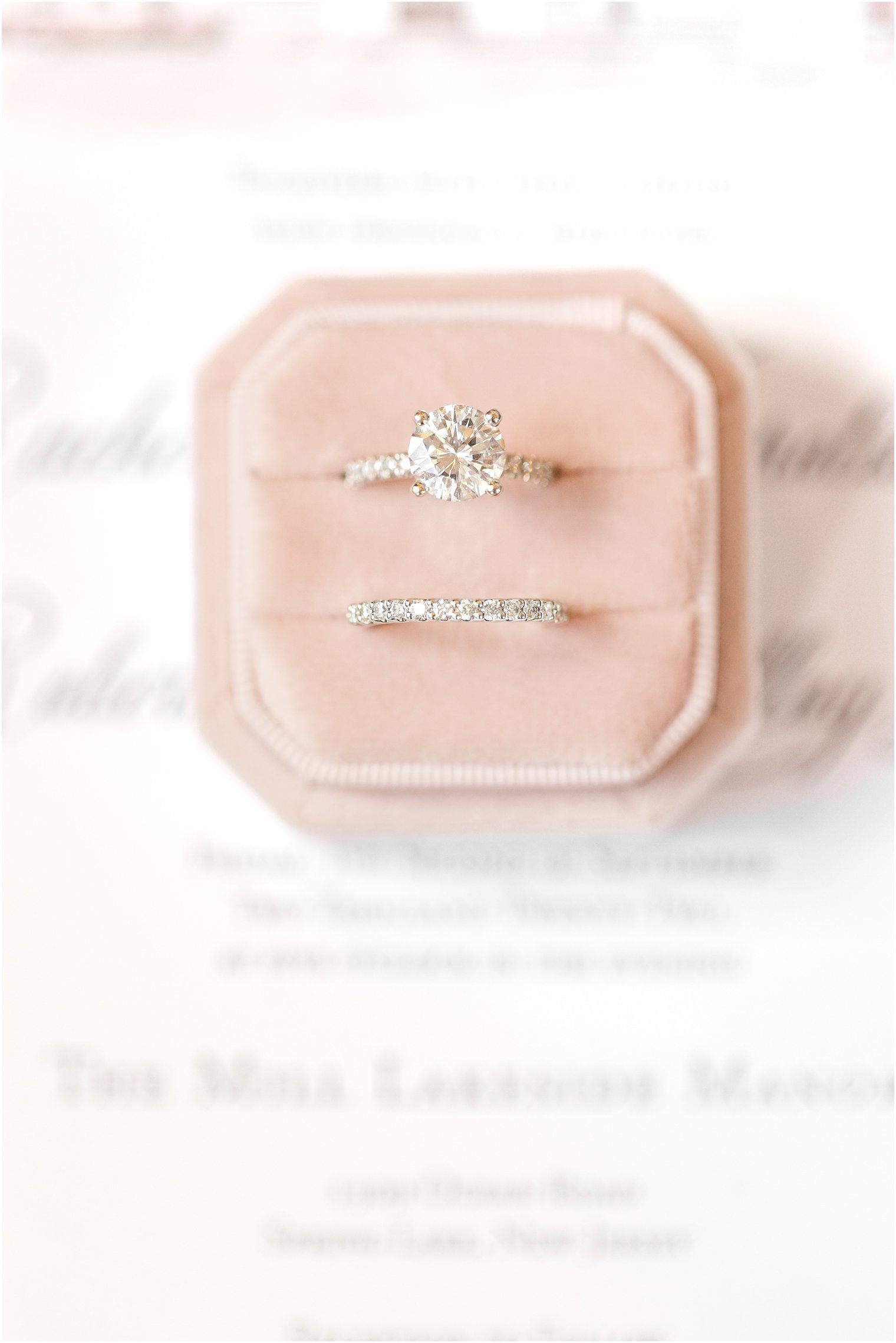 bride's ring rests in pink box before fall wedding at the Mill Lakeside Manor
