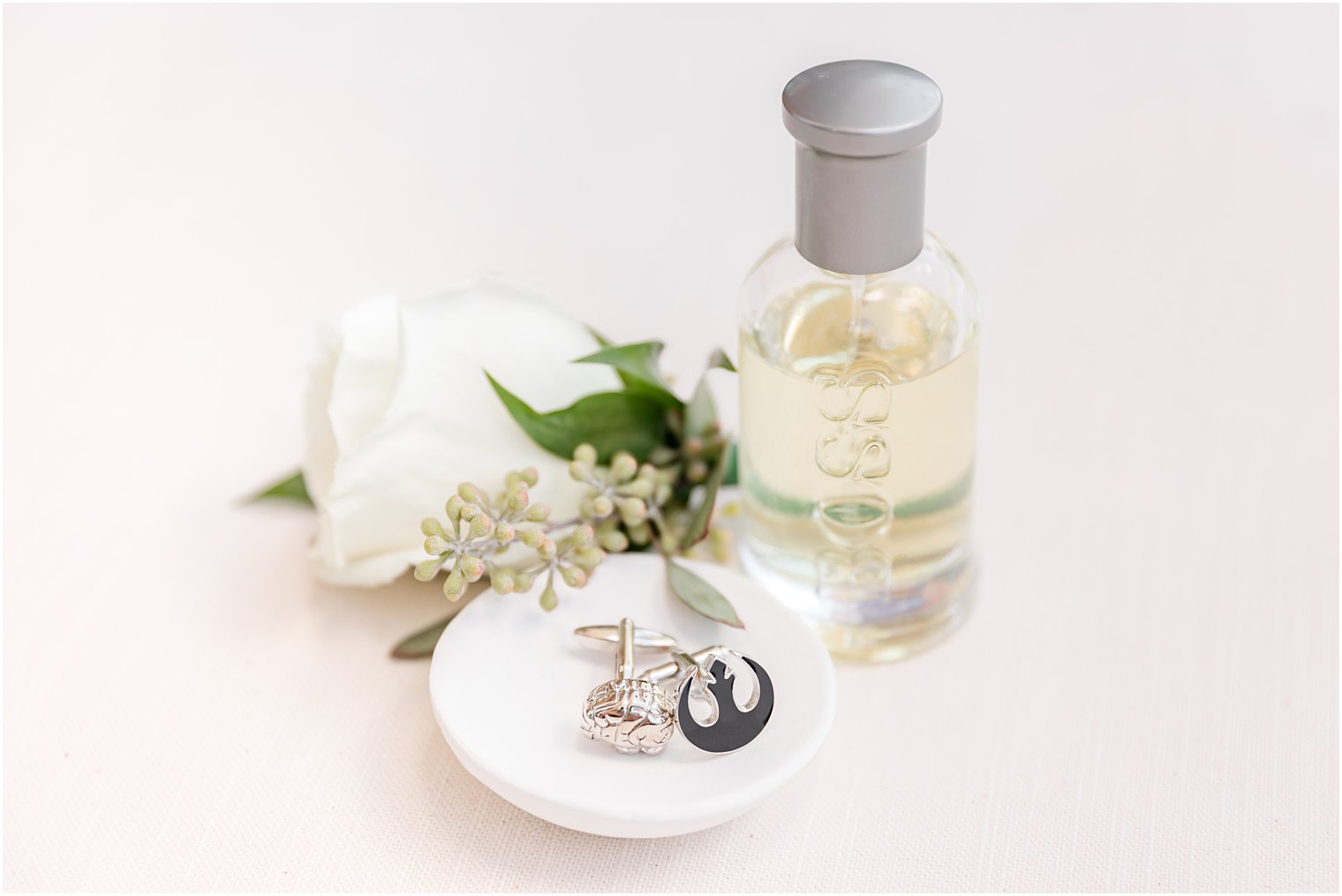 groom's boutonnière and cologne