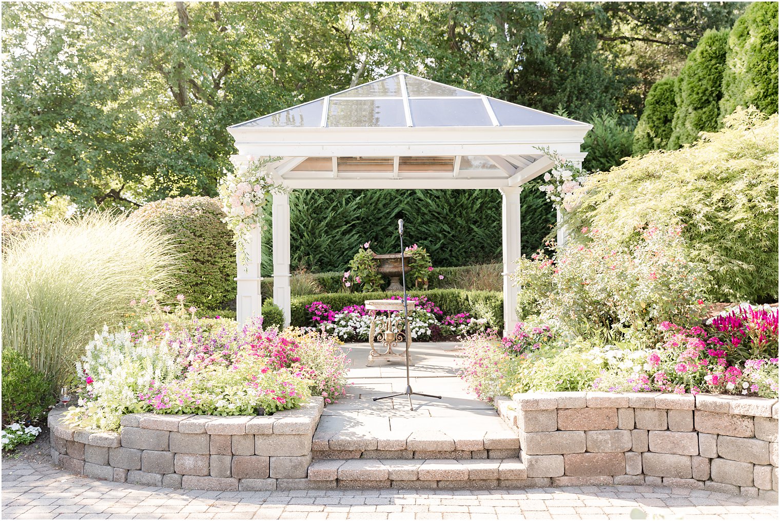 garden wedding ceremony for fall wedding at The Mill Lakeside Manor