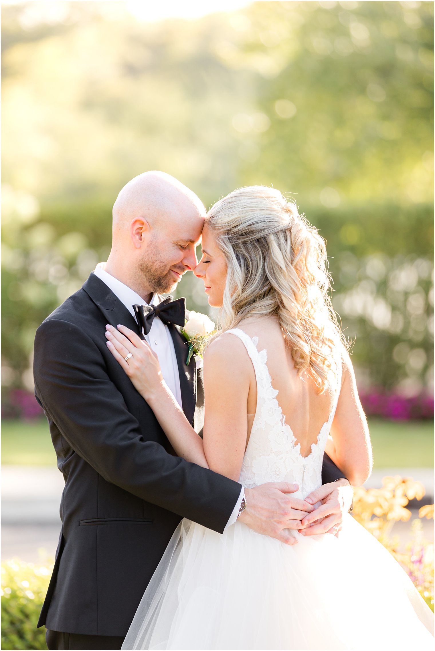 bride leans forehead against groom at The Mill Lakeside Manor