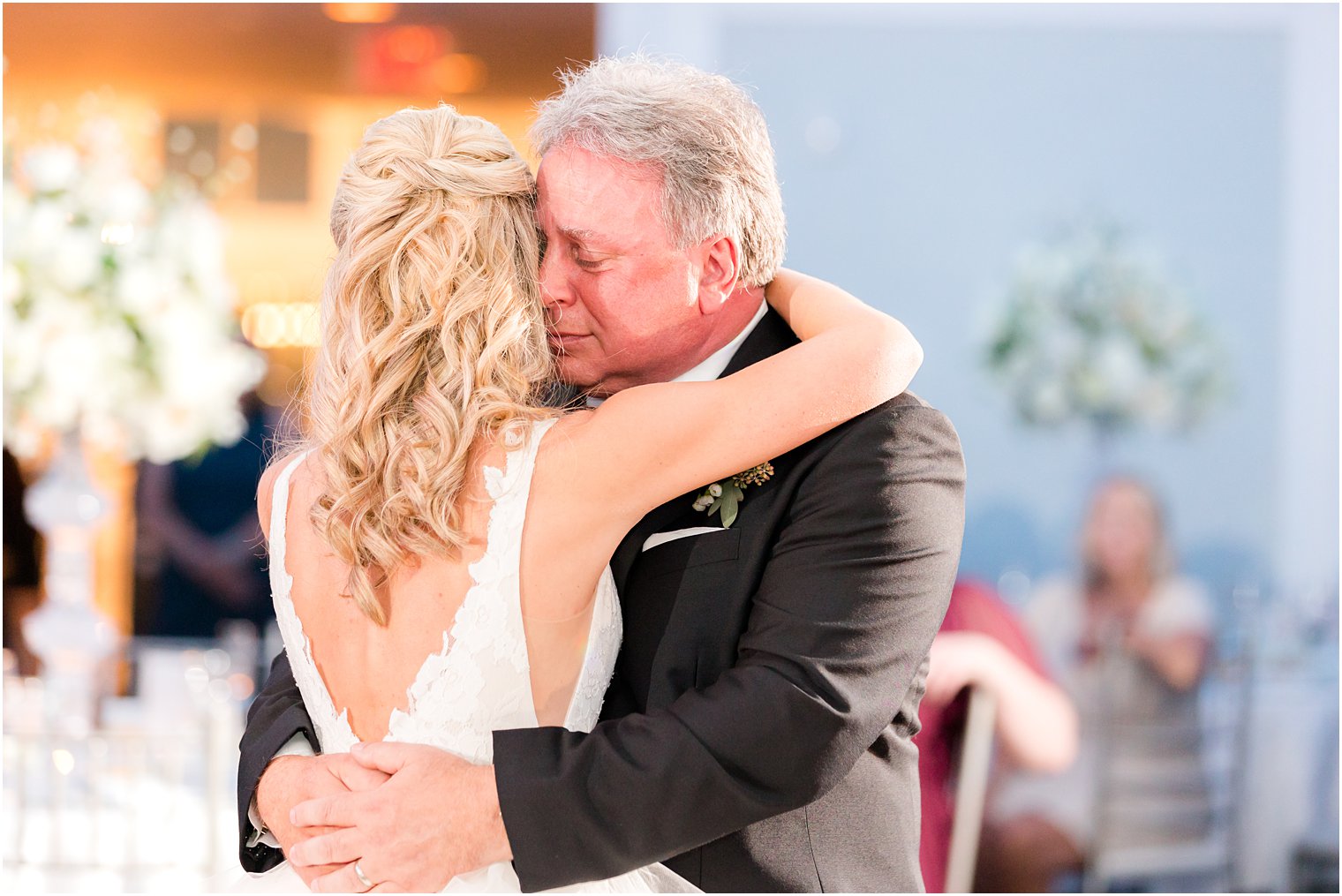 dad hugs daughter during dance in New Jersey