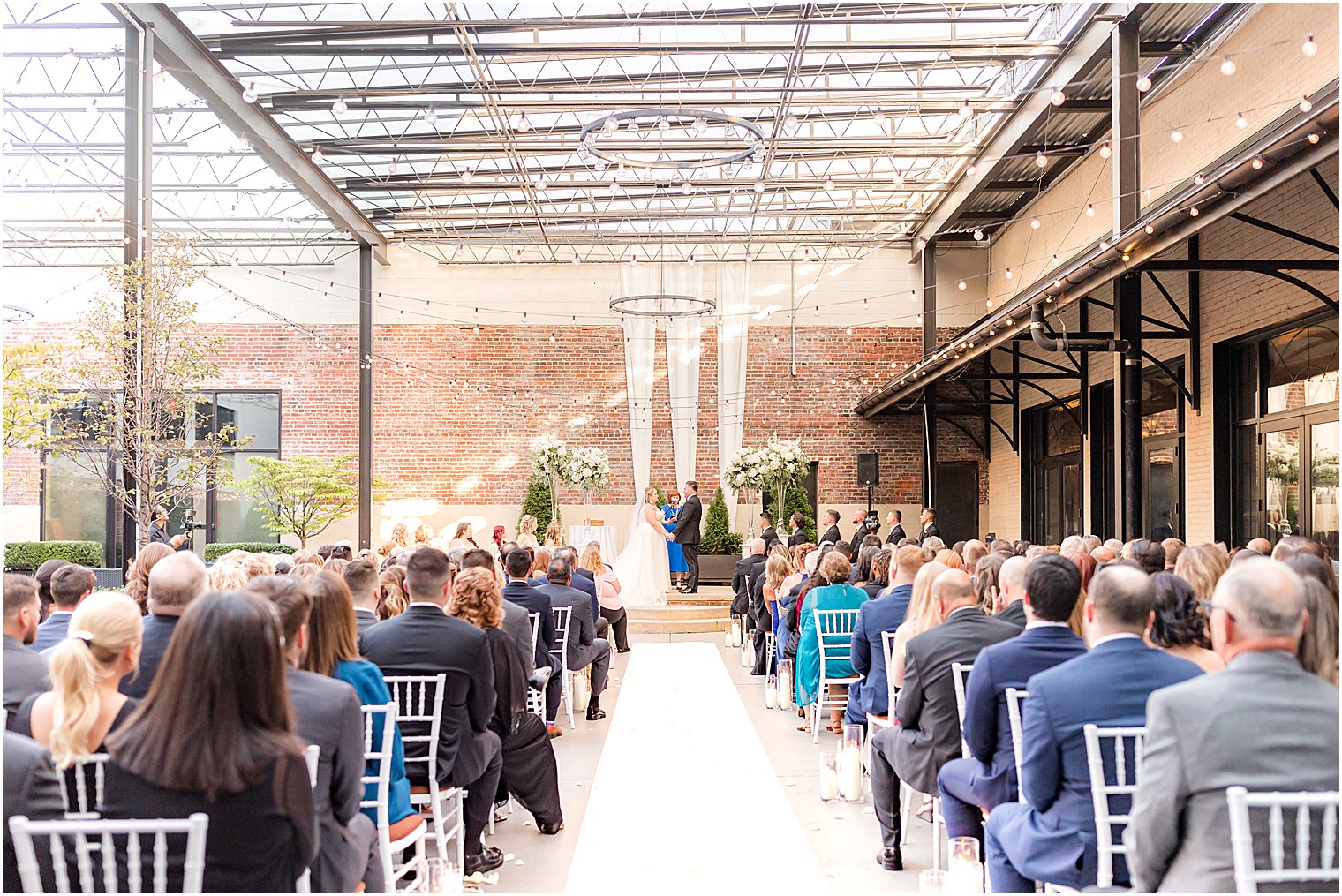 Vie by Cescaphe wedding ceremony in courtyard 