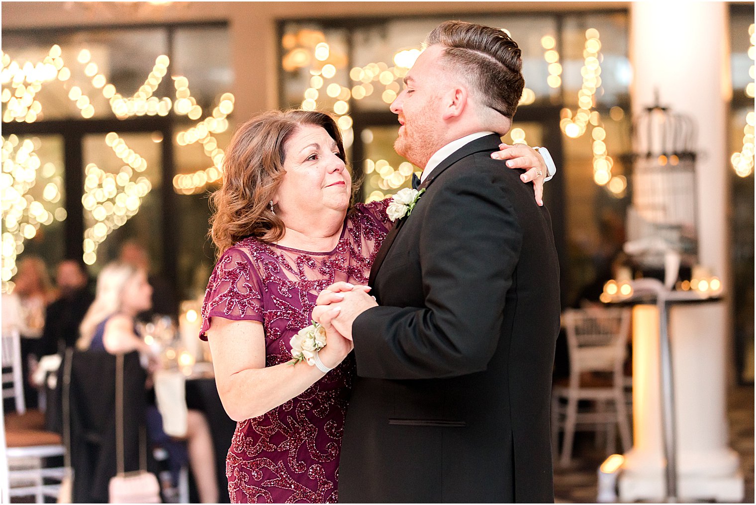 groom and mom dance during Philly wedding reception