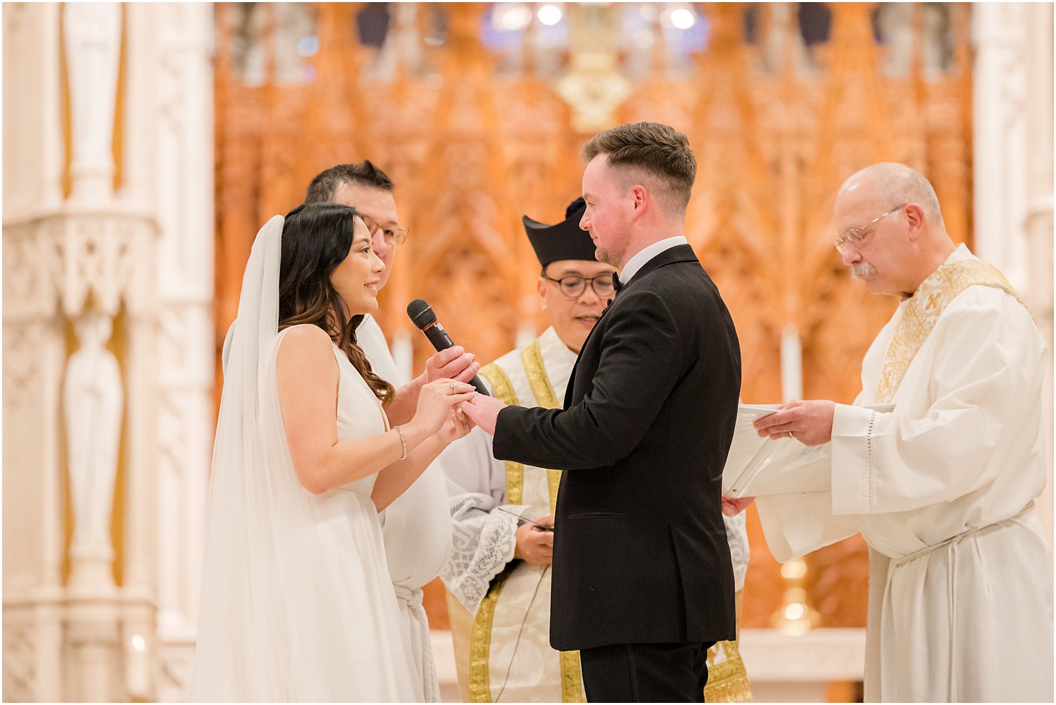 bride recites vows during The Cathedral Basilica of the Sacred Heart wedding ceremony 
