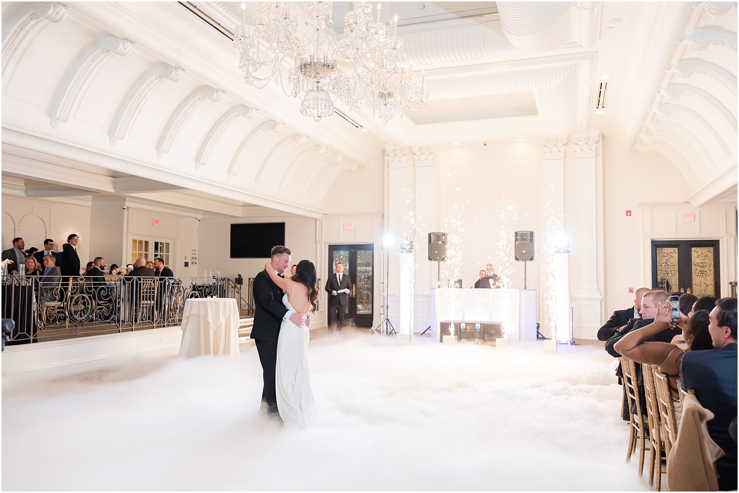 newlyweds dance in fog at Nanina's in the Park