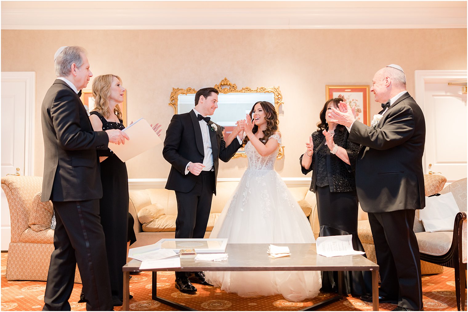 newlyweds cheer after Ketubah signing 