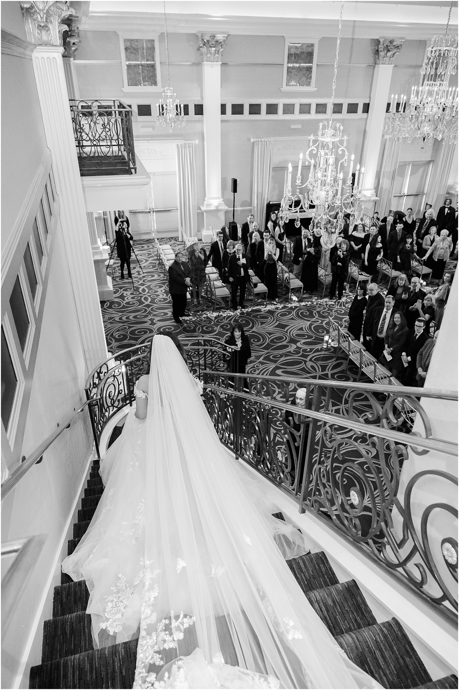 bride walks down steps for ceremony at the Palace at Somerset Park