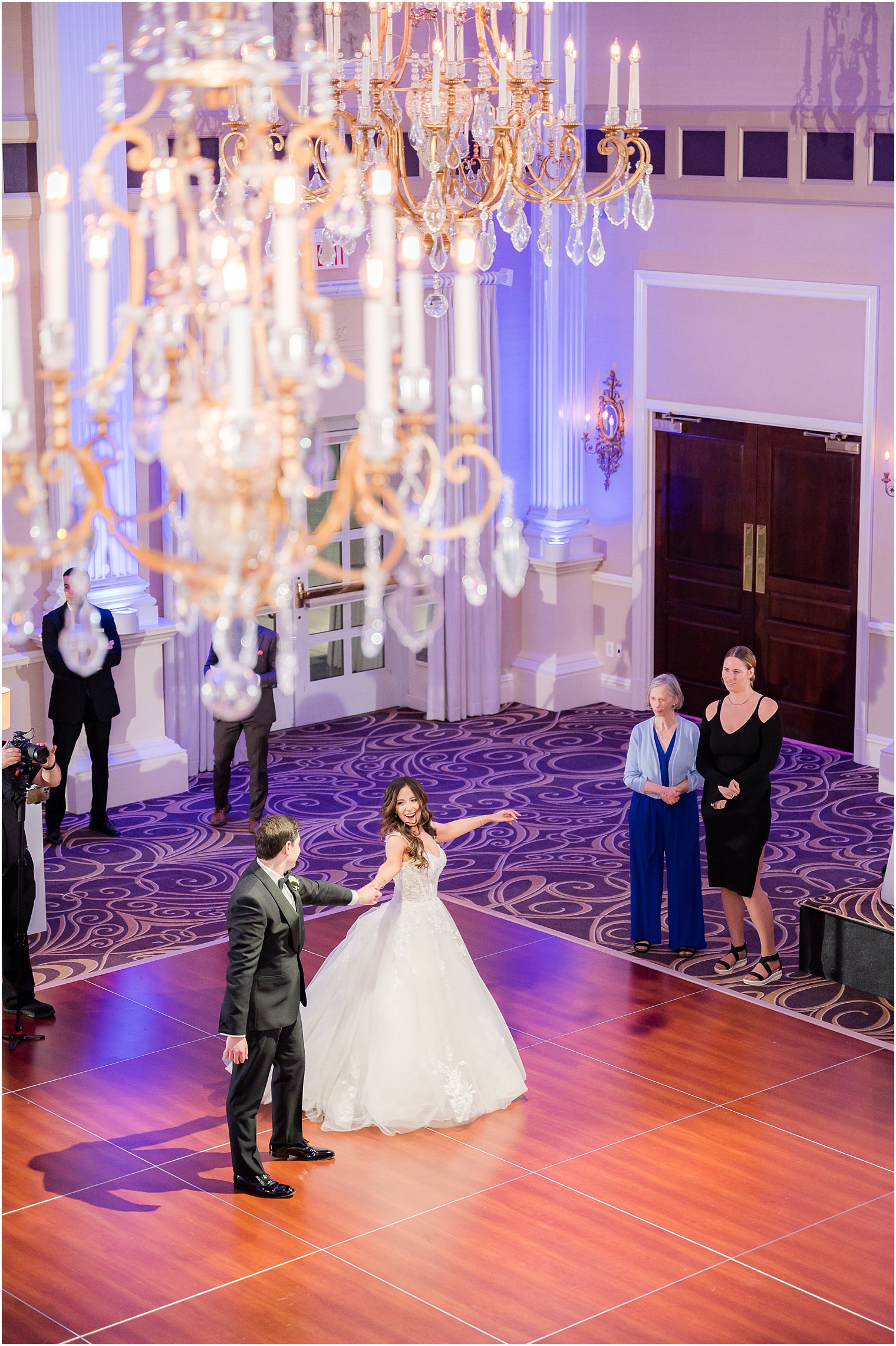 groom spins bride out on dance floor at the Palace at Somerset Park