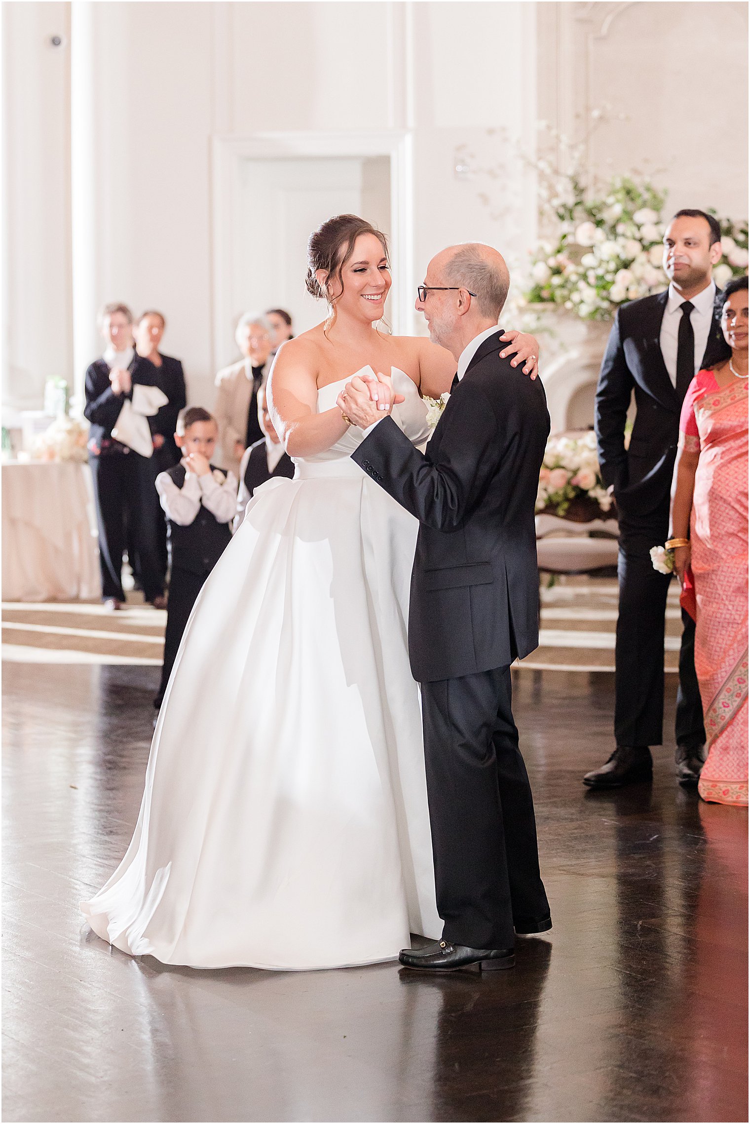bride and father dance during NJ wedding reception at Park Chateau Estate