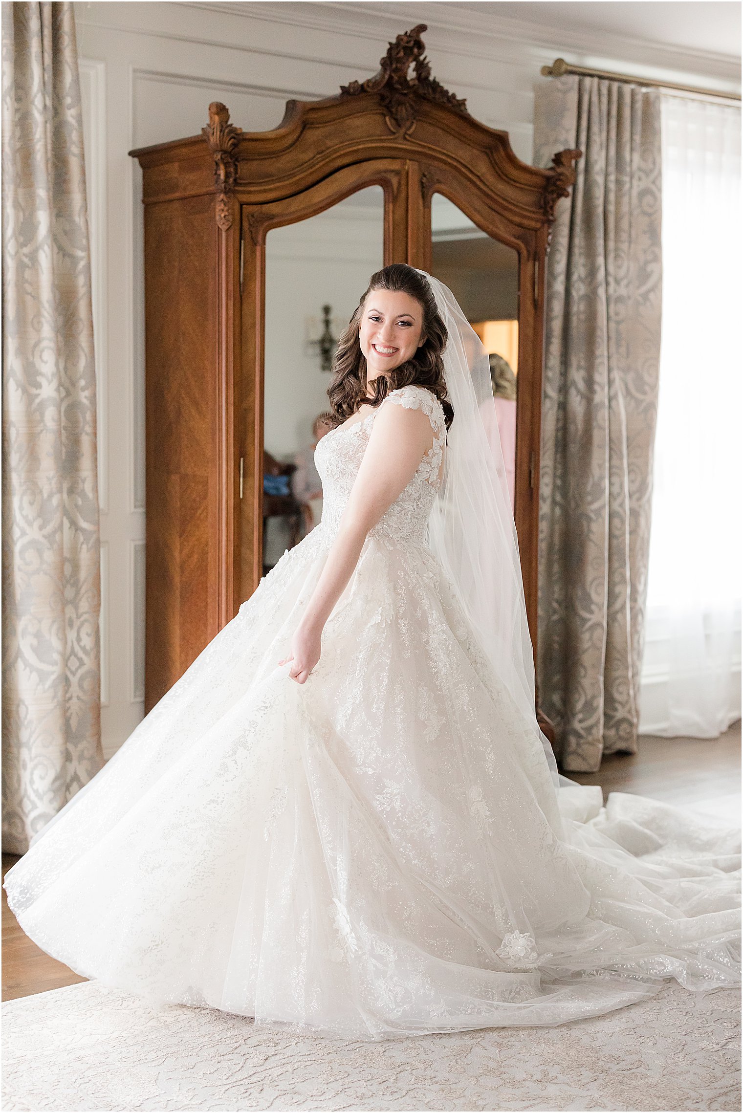 bride twirls wedding dress in suite at Park Savoy Estate