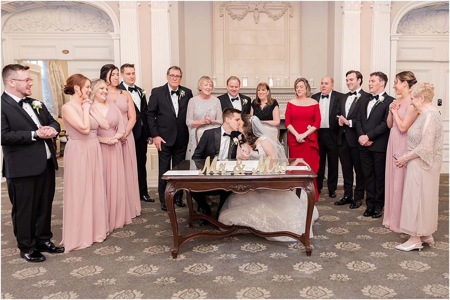 newlyweds kiss after Ketubah signing at Park Savoy Estate