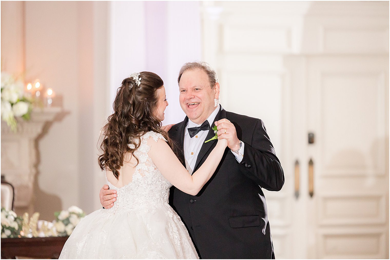 father dances with bride during reception at Park Savoy Estate