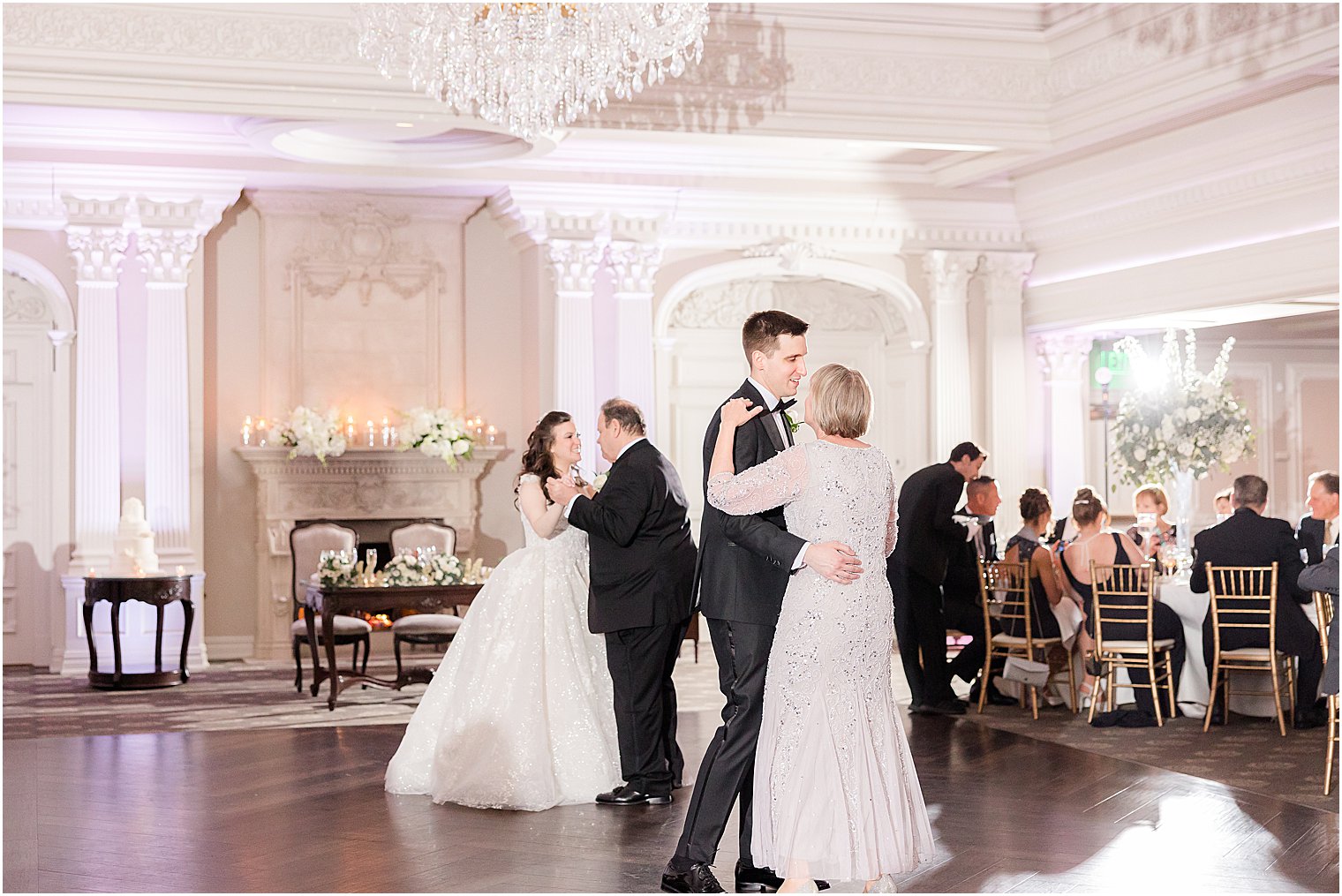 bride and groom dance with parents at Park Savoy Estate