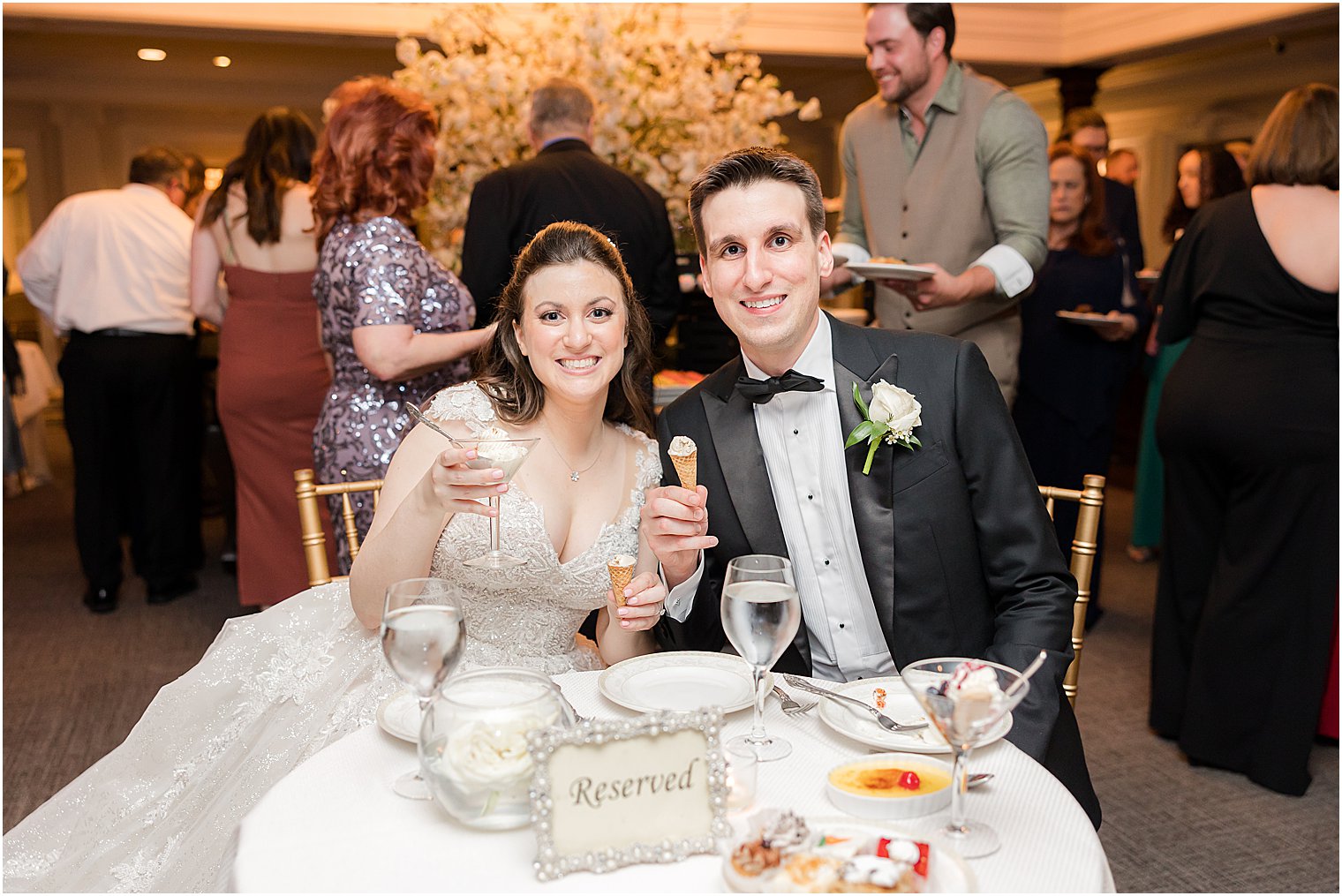 newlyweds show off ice cream at NJ wedding reception 