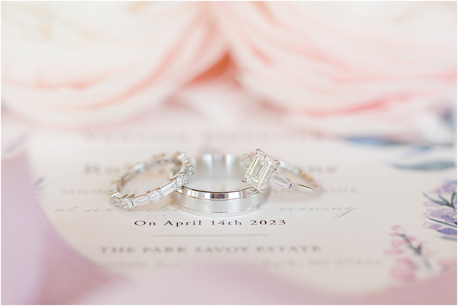 wedding rings on pastel invitation suite at Park Savoy Estate
