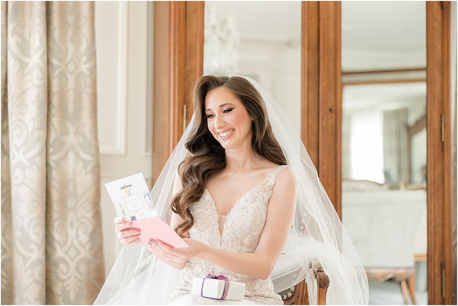 bride reads letter on wedding morning at Park Savoy Estate