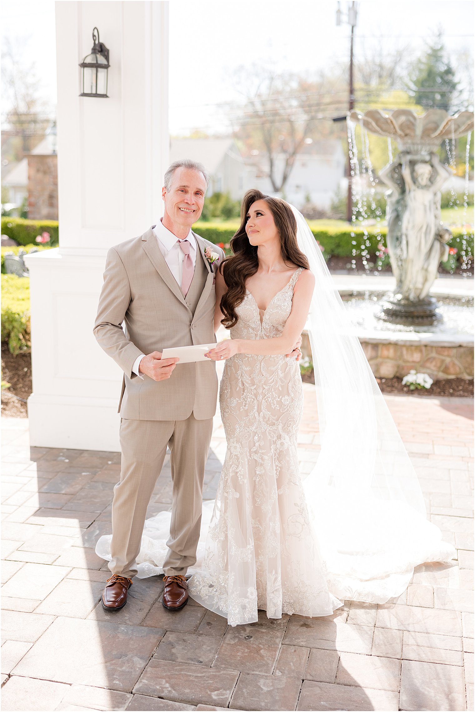 bride and father pose under awning at Park Savoy Estate