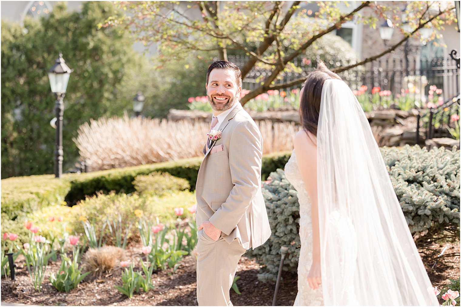 groom turns to look at bride during first look